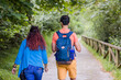 © Sangiao_Photography - Unrecognizable mixed race mid couple ecotourism hiking in senda del oso, Asturias conservation