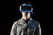 © dewaai - a man wearing a virtual reality headset with neon light isolated on black background