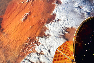 Wall Mural - beauty of africa. orange color lands seen from space. digital enhancement. elements by nasa