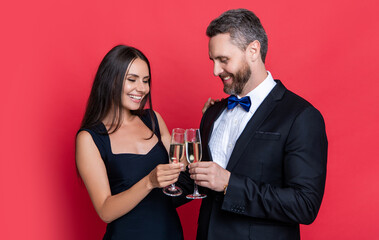 Wall Mural - cheerful couple cheering and celebrate on background. photo of couple cheering and celebrate