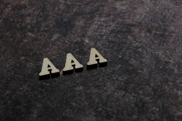 Wall Mural - the initials of the letter aaa. triple a.