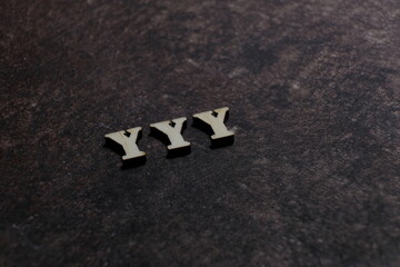 Wall Mural - the initials of the letter yyy. triple y.