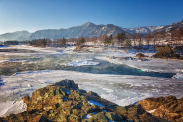 Wall Mural - Winter landscape. River in Altai on a sunny day. Russia