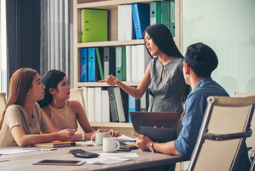 Poster - Happy business people meeting present graph chart investment, business data in meeting room. Group of business people meeting in conference room. Asian businessman speech, present teamwork partnership