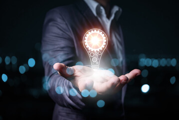 Aufkleber - Innovation. Business man hand holding light bulb for Concept of new idea concept with innovation and inspiration, innovative technology in science and communication concept