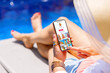 © Kaspars Grinvalds - Woman viewing video feed posted on social media app