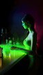 © Polarpx - Single girl in a bar going out alone in the moody nightlife in dim light
