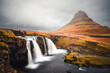 Aerial view of Mount Kirkjufell with waterfall and river in Iceland.