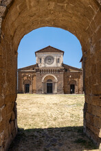 Italy, Lazio, Tuscania, Facade Of San Pietro Church With Arched Entrance In Foreground