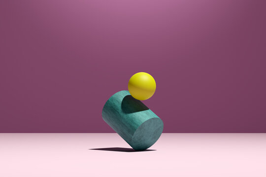 A yellow sphere is balancing on top of a geometrical cylinder shape.