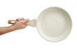 Hand holding a ceramic frying pan isolated on white background. Studio shot