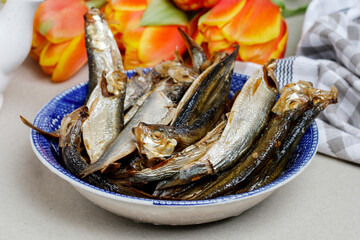 Wall Mural - Smoked sprats in a bowl.