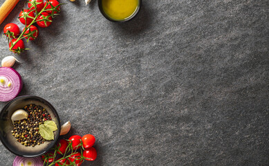 Poster - Ingredients for cooking. Food background with spices, olive oil and vegetables on dark background top view, recipe and menu concept