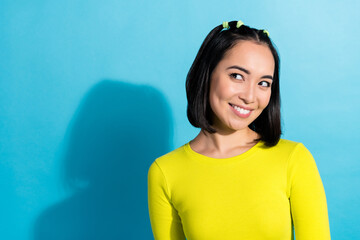 Wall Mural - Closeup photo of young cute cheerful japanese lady smiling look dreamy empty space enjoy her boyfriend proposition isolated on blue color background