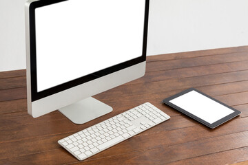 Poster - Office desk with computer and digital tablet on desk