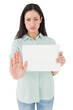 Woman showing card and saying stop