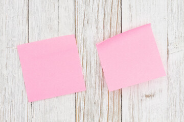 Poster - Two blank pink sticky note on weathered wood