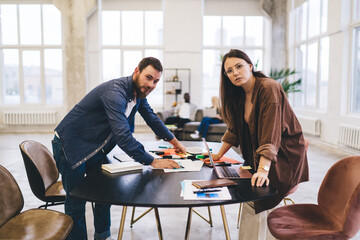 Wall Mural - Business colleagues working on project in workplace