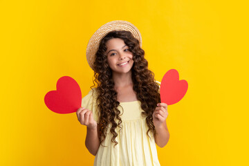 Poster - Lovely child teen girl with shape heart love holiday and valentine symbol. Valentine or birthday day. Gift heart present. Happy teenager, positive and smiling emotions of teen girl.