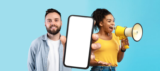 mobile offer. man and woman using megaphone and holding big blank smartphone