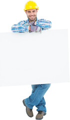 Wall Mural - Confident male technicial holding blank billboard