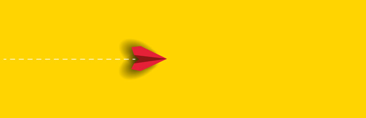 red paper airplane is flying on yellow background. new job, walking alone, idea concepts.