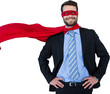 Portrait of businessman wearing cape and eye mask