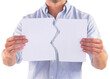 Man holding torn white paper