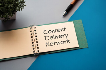 Poster - There is a notebook with the word Content Delivery Network. It is eye-catching image.
