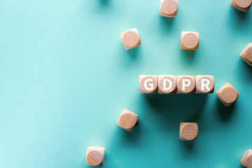 there is wood cubes with the word gdpr. it is an abbreviation for general data protection regulation