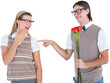Geeky hipster offering red roses to his girlfriend 