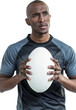 Thoughtful athlete holding rugby ball