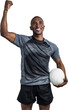 Happy sportsman with clenched fist holding rugby ball