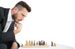 Hipster businessman playing game of chess 