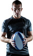 Thoughtful rugby player holding ball