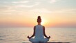 © vipcrew - Young woman practicing yoga by the sea at sunset, Beautiful girl meditate outdoor, Harmony, meditation, healthy lifestyle and travel concept