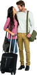 Smiling couple with luggage looking at each other