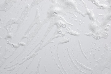 Wall Mural - Foam bubble from soap or shampoo washing isolated on white background top view