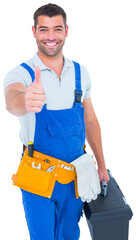 Wall Mural - Happy repairman with toolbox gesturing thumbs up