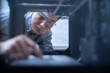 © Blue Jean Images - Confident Chinese designer using a 3D printer