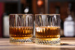 © Pixel-Shot - Glasses of cold rum on table in bar