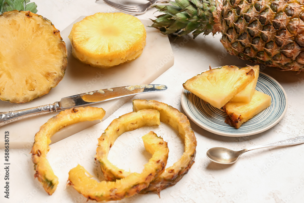 Fresh cut pineapple on white grunge background
