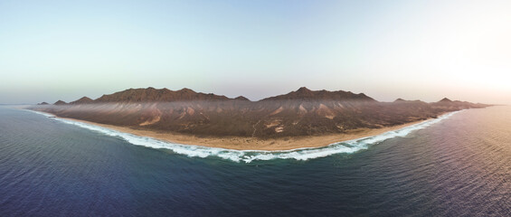 Poster - View from above, stunning panoramic view of Cofete beach surrounded by the chain of mountains of the Jandía Natural Park. Fuerteventura, Canary Islands.