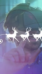 Poster - Animation of santa in sleigh over caucasian man with vr headset