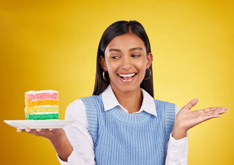 Sticker - Birthday, smile and woman with cake in studio for happy celebration or party on yellow background. Happiness, excited gen z model with rainbow dessert on plate to celebrate milestone or achievement.