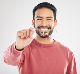 Poster - Glasses, happy man and portrait in a studio with a smile from vision showing eye care product. Isolated, white background and happiness of a Asian male model with lens prescription and frame check