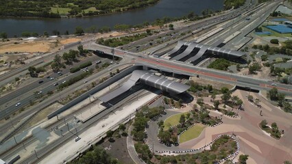 Poster - Aerial orbit shot of highway traffic and railway station in Perth, Australia