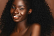 © Beauty Agent Studio - African beautiful woman portrait. Brunette curly haired young model with dark skin and perfect smile