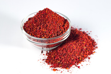 Sticker - Crushed paprika on a white background. traditional spice