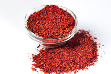 Sticker - Crushed paprika on a white background. traditional spice